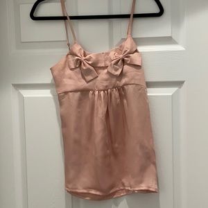 Light pink, spaghetti strapped top.